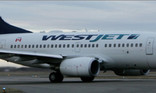 Un avion de WestJet atterrit d'urgence à Winnipeg suite à une menace : Six personnes blessées
